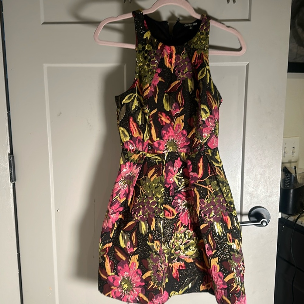 Gianni Bini dress size small. Very classy Never worn .